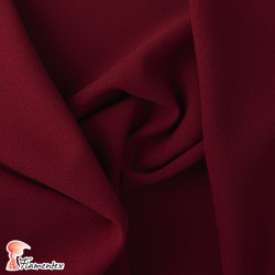 JULIETA. Plain polyester fabric with spandex, ideal for trousers. Summer item.