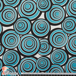 SOLEARES. Stretch satin fabric, perfect for fitted flamenco dresses. 80's style circle print.