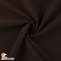 JULIETA. Plain polyester fabric with spandex, ideal for trousers. Summer item.