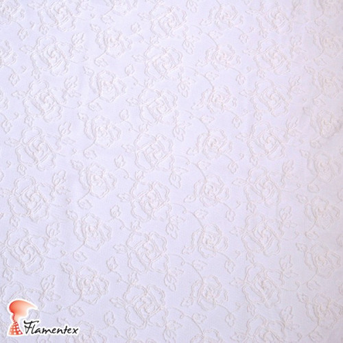 JAVA. Embroidered tulle fabric ended with lace. Used for bridal, special occasion and flamenco dresses.