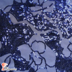 EVELYN. Abstract patterned tulle and sequin fabric. Normally used for special occasion dresses.