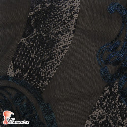 ASAFIN. Abstract patterned tulle and sequin fabric. Normally used for special occasion dresses.