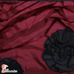 NOELIA. Crinkle fabric with superimposed flowers. Normally used for special occasion dresses.