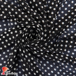 RAIZA. Thin chiffon fabric with printed polka dots 1,80 cm.