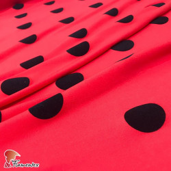 PARAYAS FLOCK. Knit fabric with velvet polka dots, normally used for rehearsal skirts.