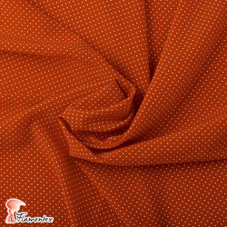 NATASHA. Drape crêpe fabric. Normally used for flamenco dresses. Micro polka dot print.