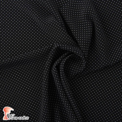 NATASHA. Drape crêpe fabric. Normally used for flamenco dresses. Micro polka dot print.