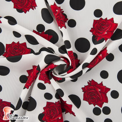 NATASHA. Drape crêpe fabric. Normally used for flamenco dresses. Irregular polka dots and roses print.