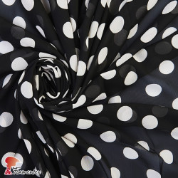 CONQUISTA. Thin chiffon fabric with 2,5 cm. polka dots pattern.