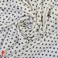 CONQUISTA. Thin chiffon fabric with 7 mm. polka dots pattern.