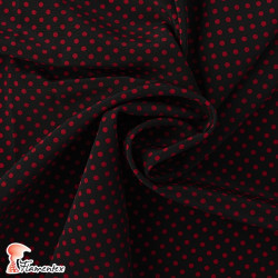 NATASHA  TOPO PQ. Drape crêpe fabric. Normally used for flamenco dresses. Small polka dot print 0,40 cm.