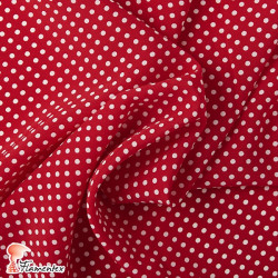 NATASHA  TOPO PQ. Tela de crespón con mucha caída, perfecta para trajes de flamenca. Estampado de lunares pequeños de 0,40 cm.