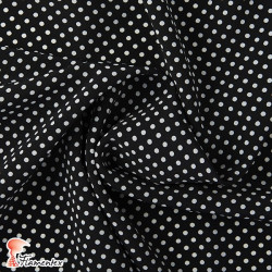 NATASHA  TOPO PQ. Drape crêpe fabric. Normally used for flamenco dresses. Small polka dot print 0,40 cm.