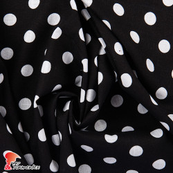 SARIL. Printed viscose and linen fabric, with 2 cm of diameter polka dots.