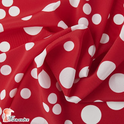 NATASHA TOPO IRREGULAR GR. Drape crêpe fabric. Normally used for flamenco dresses. Irregular polka dot.